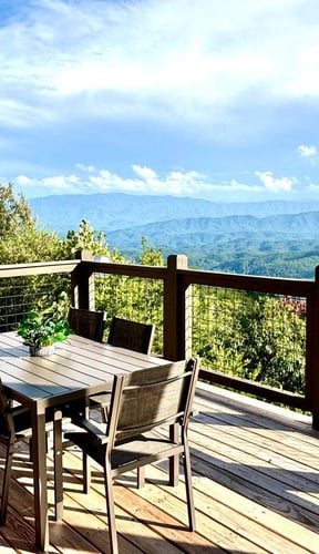 Outdoor deck with mountain views at a Smoky Mountains cabin